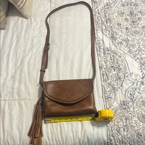 Elegant Tan Crossbody Bag with Tassel